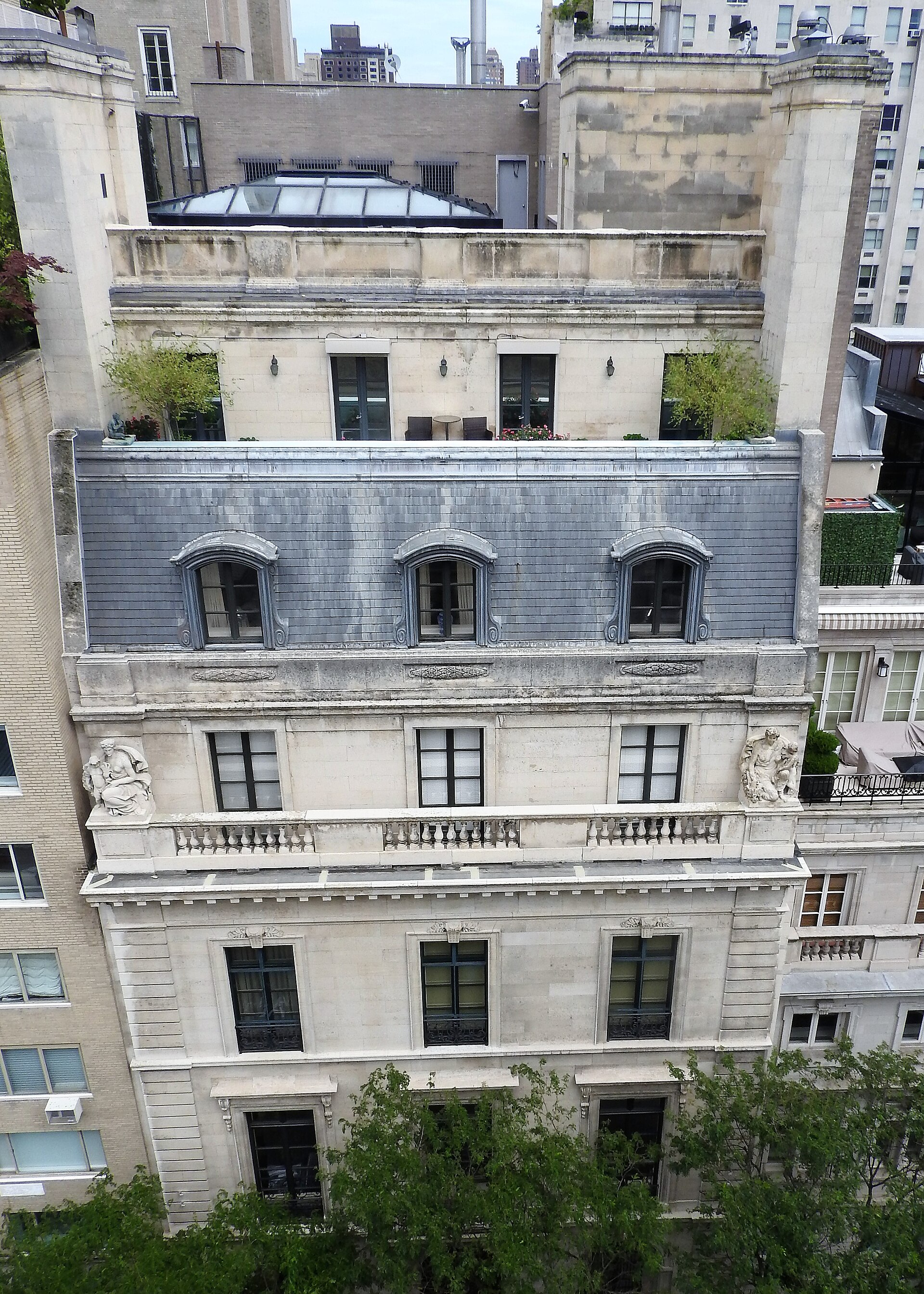 Herbert N. Straus House — 9 East 71st Street, major 1989–90 residential conversion — Looking north from Frick terrace at 9 East 71st Street on a cloudy day. Photographed in 2019; a current view, not a construction-period photograph.