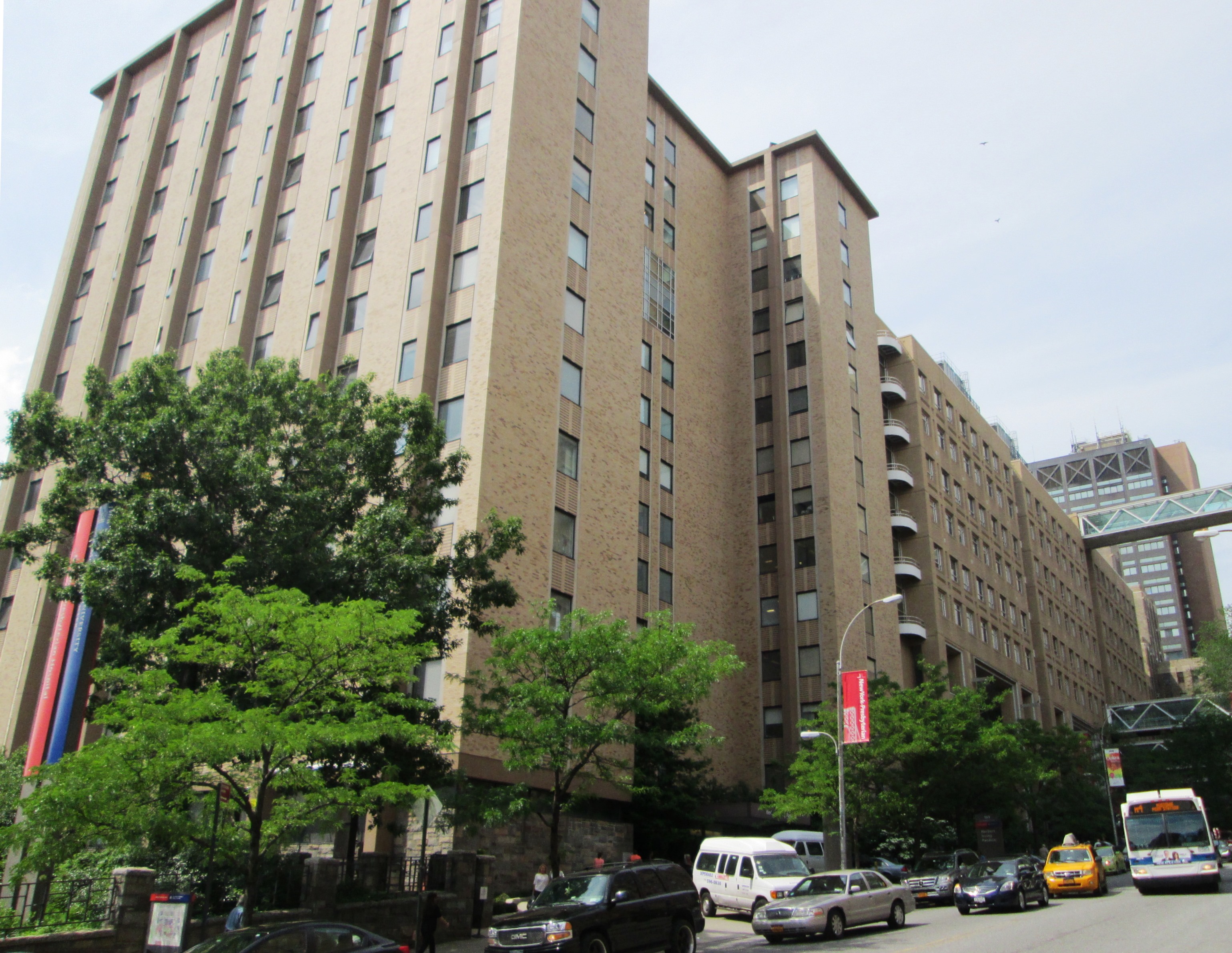 Presbyterian Hospital modernization — The Herbert Irving Pavilion and Milstein Hospital Building, photographed in 2014. Kelly's masonry contract for the Presbyterian modernization is documented; the Milstein building remains the leading identification pending confirmation of the original subcontract.