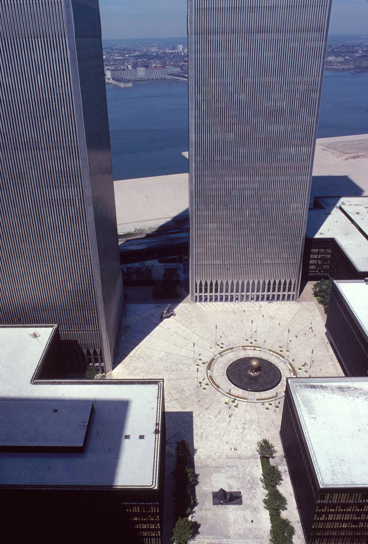 Original 4 World Trade Center — Southeast Plaza Building — Aerial view of the World Trade Center plaza in 1978, with the original 4 World Trade Center among the low plaza buildings. A general plaza view, not a photograph of Kelly's masonry scope.