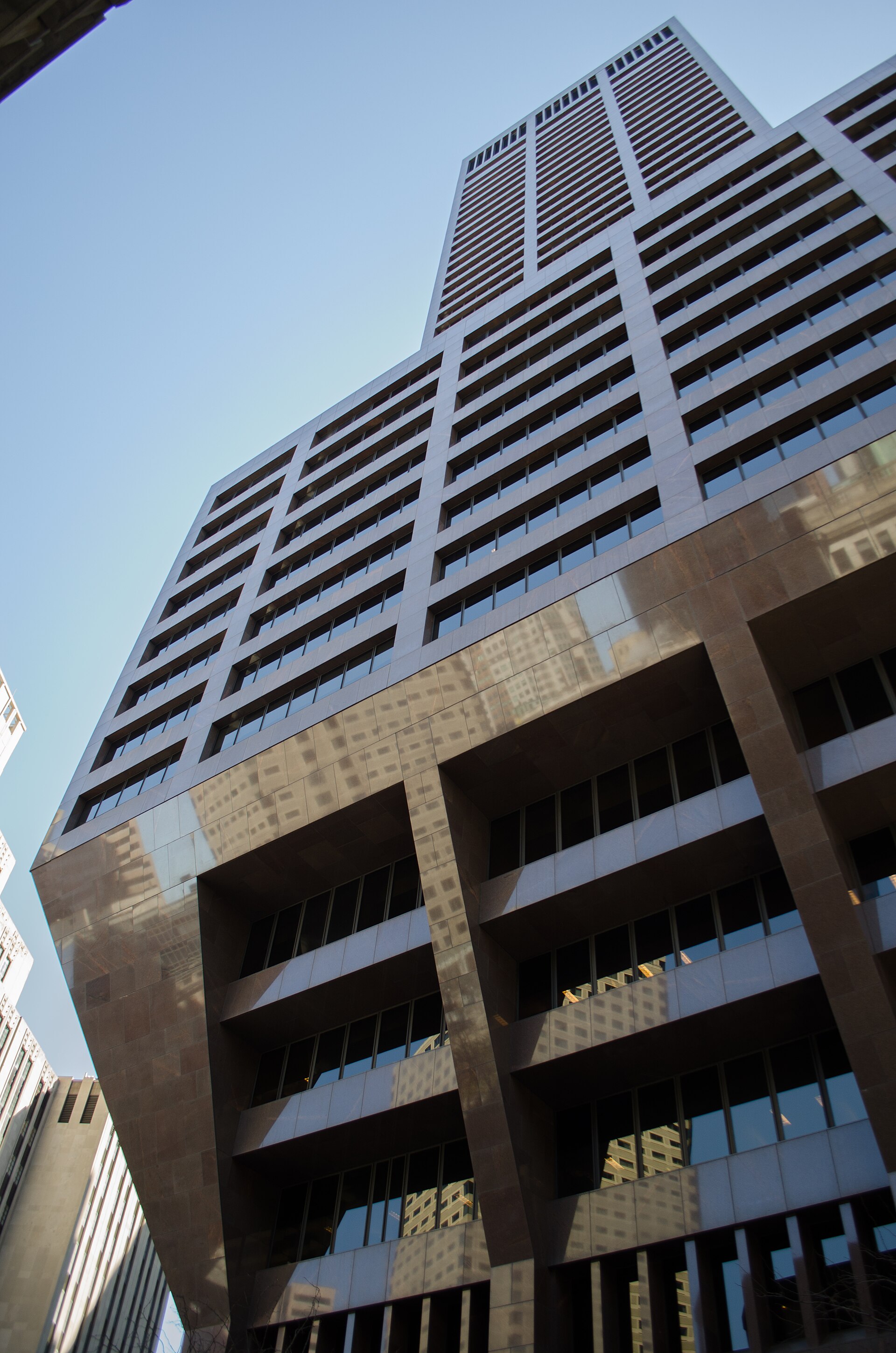 First National Bank Building / 100 Federal Street — The First National Bank Building at 100 Federal Street in Boston, Massachusetts. Also known as the "Pregnant Building" due to its. Photographed in 2014; a current view, not a construction-period photograph.