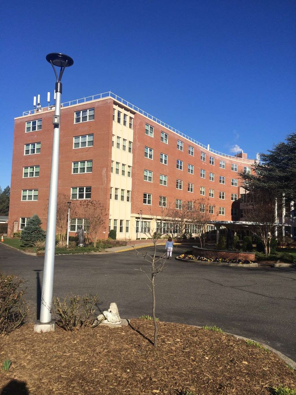 Queen of Peace Residence, Little Sisters of the Poor — Current exterior of Queen of Peace Residence, 110-30 221st Street.