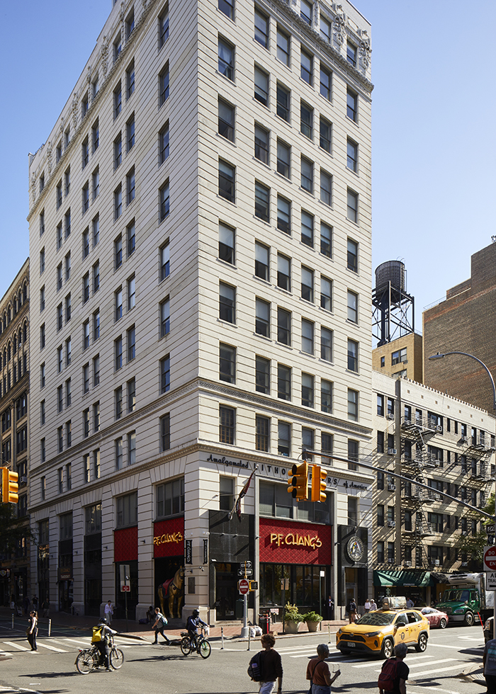 Amalgamated Lithographers of America Building — brick sidewalk, 113 University Place — 113 University Place with the red-brick paver sidewalk at the corner of East 13th Street, photographed for Village Preservation.