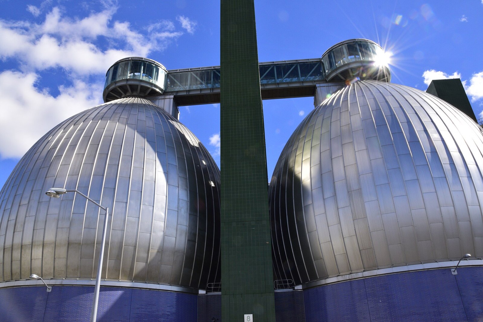 Sludge Thickner Building — Newtown Creek Wastewater Treatment Plant digesters, Greenpoint, Brooklyn. Shown as trade and infrastructure context for the entry.
